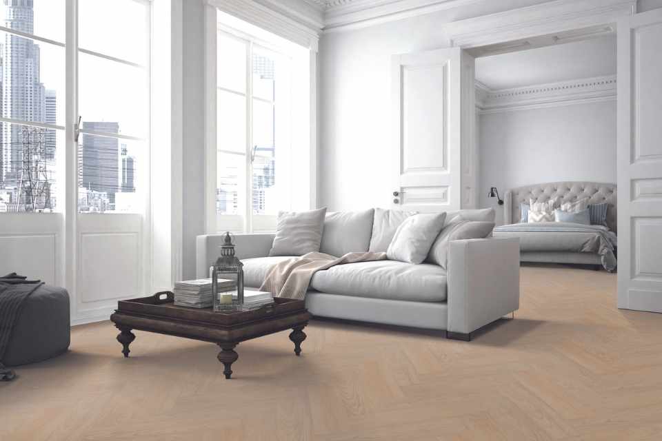 blonde herringbone hardwood in all white living room